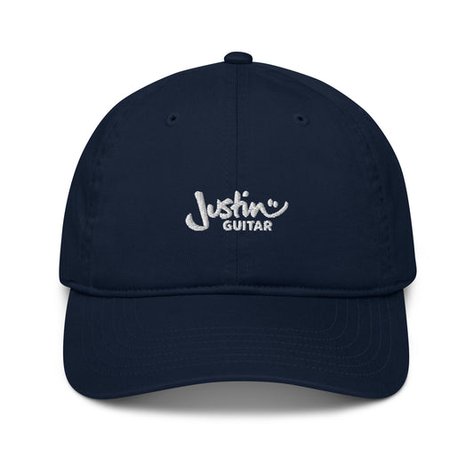 Navy baseball cap with JustinGuitar logo embroidered in the front. 