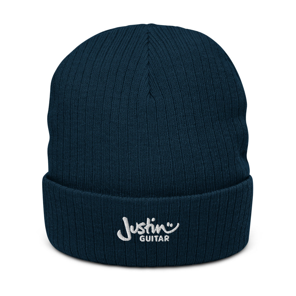 Navy beanie hat with JustinGuitar logo.