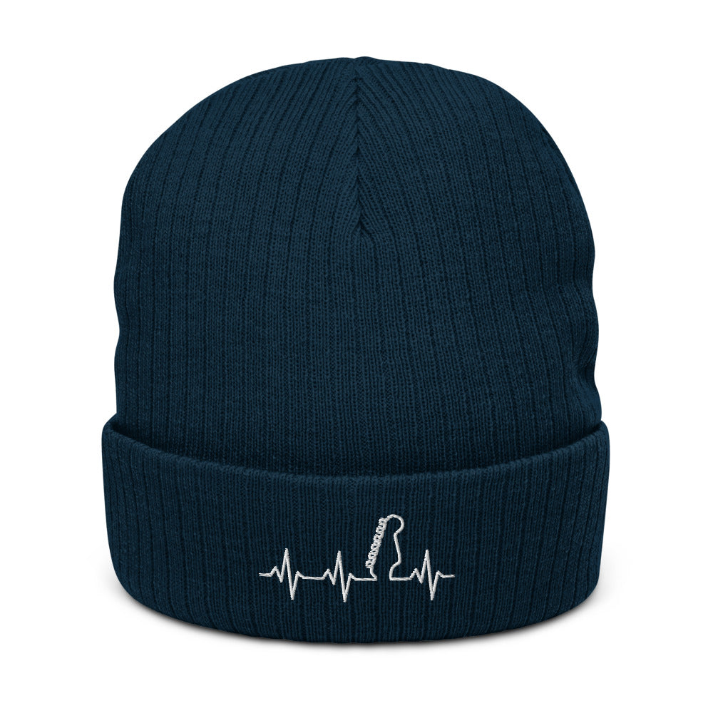 Navy green hat with guitar heartbeat design. 