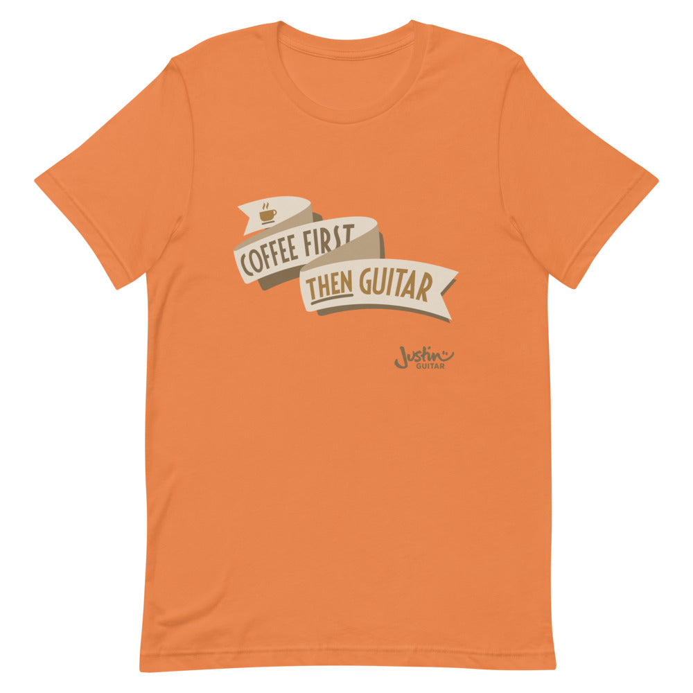 Orange tshirt with 'Coffee First, then guitar' design. 