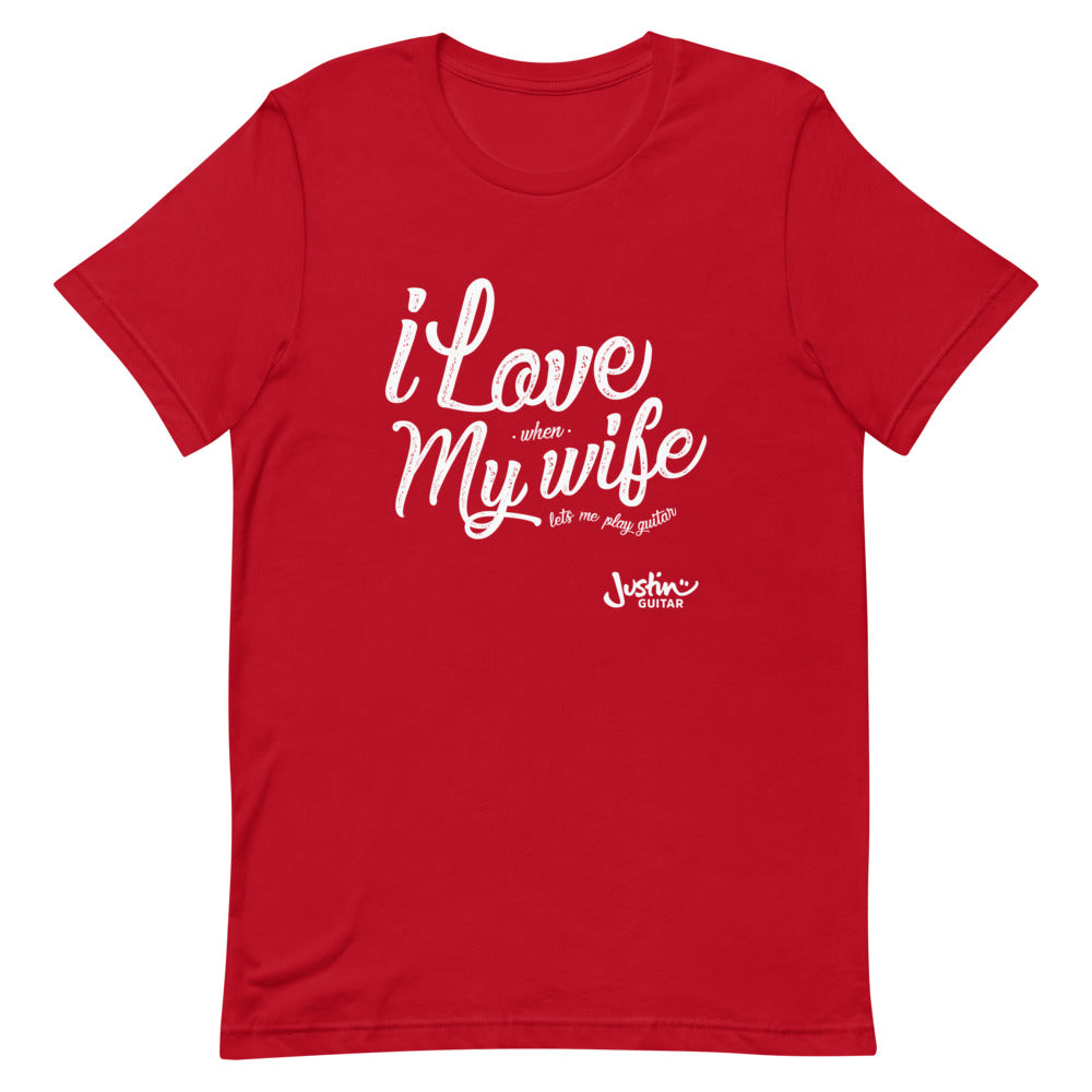 Red tshirt with 'I love when my wife lets me play guitar' design.