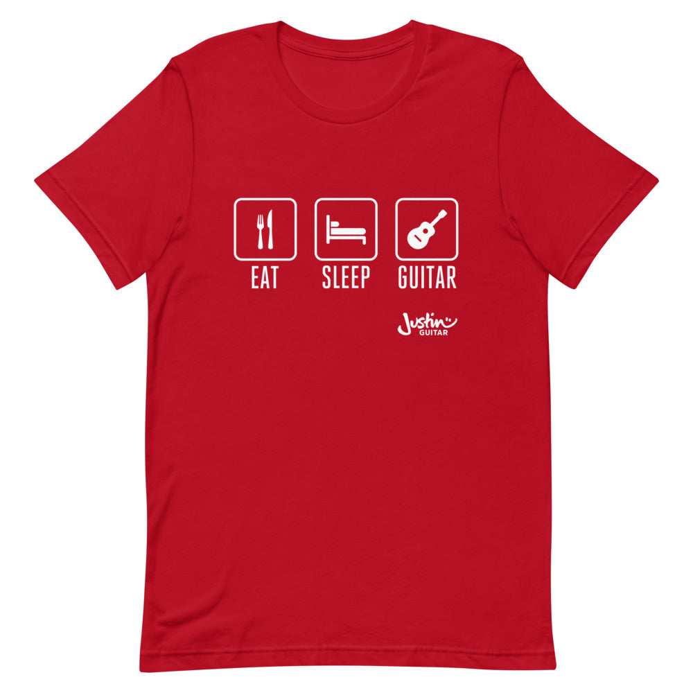 Red T-shirt with a design that says 'Eat, Sleep, Guitar'.