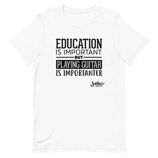 White tshirt that says 'Education is important, but playing guitar is importanter'