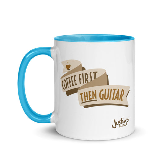 White coffee mug with blue inside and handle with 'Coffee first, then Guitar' design.